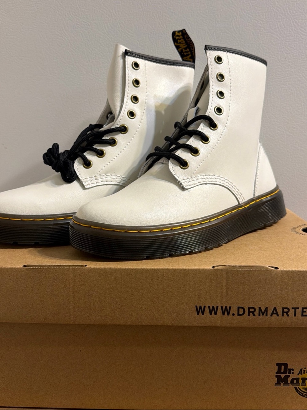 Dr. Martens White Leather Lace-Up Combat Boots with Black Accents